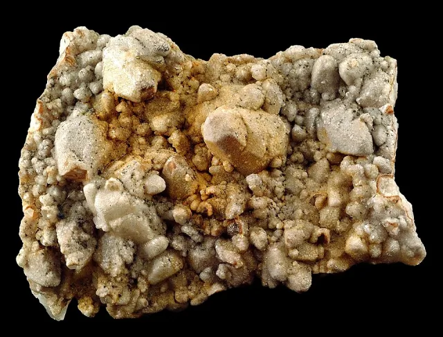Milky quartz mineral specimen on a dark background